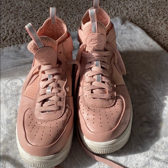 light pink nike high tops